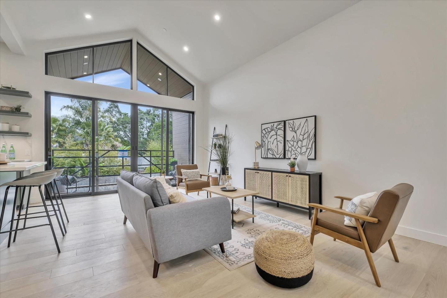 129 Darlington Soquel, CA 95073 - Photo 20 of 27 a living room with furniture and a floor to ceiling window