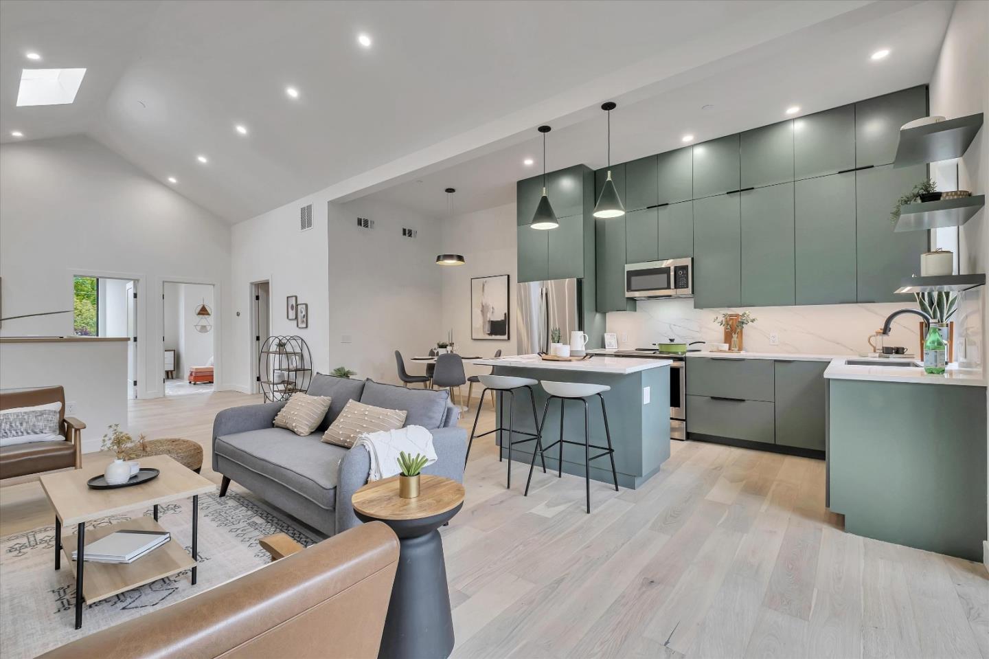129 Darlington Soquel, CA 95073 - Photo 24 of 27 a living room with furniture and a wooden floor
