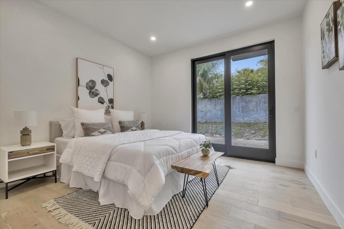 129 Darlington Soquel, CA 95073 - Photo 6 of 27 a bedroom with a large bed and a window