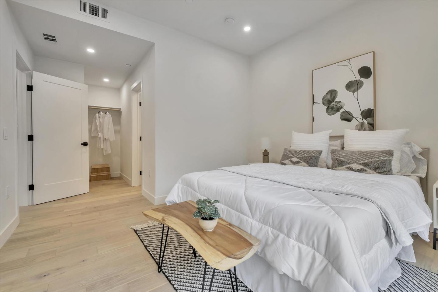 129 Darlington Soquel, CA 95073 - Photo 7 of 27 a spacious bedroom with a bed and painting on the wall