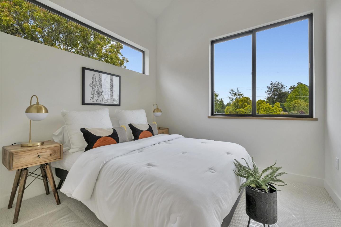 129 Darlington Soquel, CA 95073 - Photo 8 of 27 a bedroom with a bed and a painting on the wall