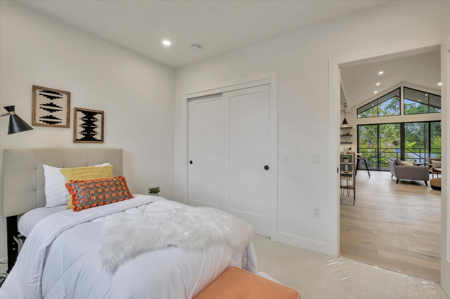 129 Darlington Soquel, CA 95073 - Photo 10 of 27 a bedroom with a bed and a large window