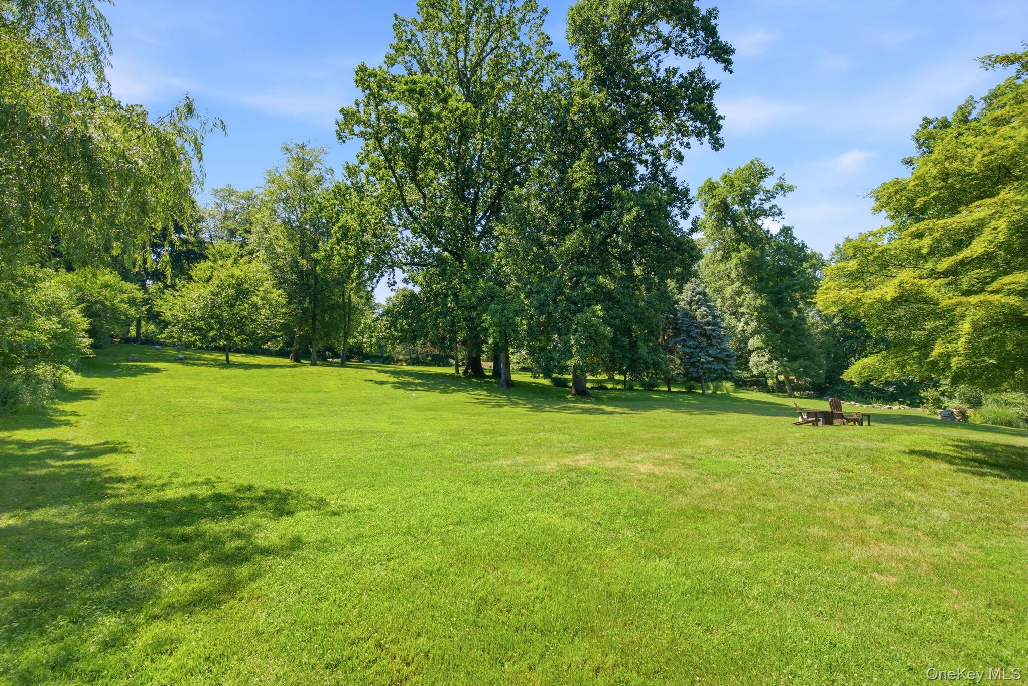 32 Bedell Road Katonah, NY 10536 - Photo 38 of 49 Acres of open, level lawn invite everything from catch to croquet.
