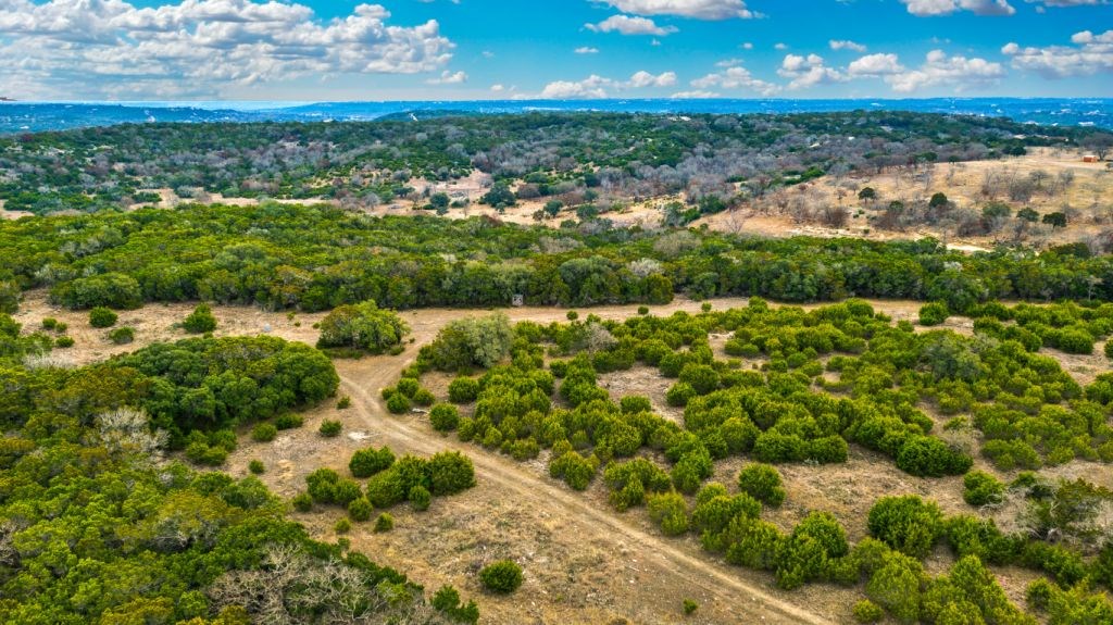 235 Merrill Lane Ingram, TX 78025 - Photo 11 of 20 a view of a lake with a city