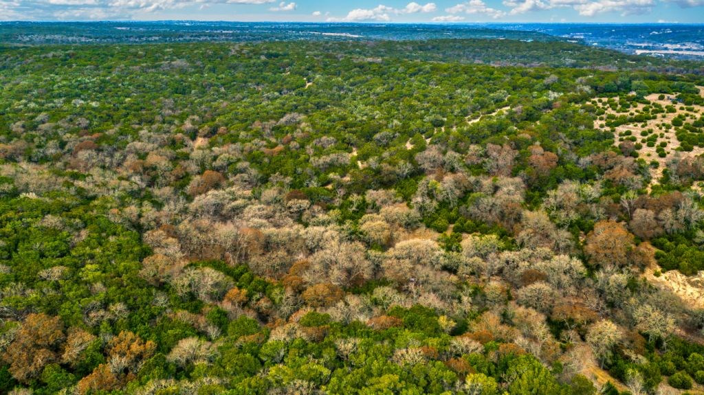 235 Merrill Lane Ingram, TX 78025 - Photo 12 of 20 a view of a field with an outdoor space