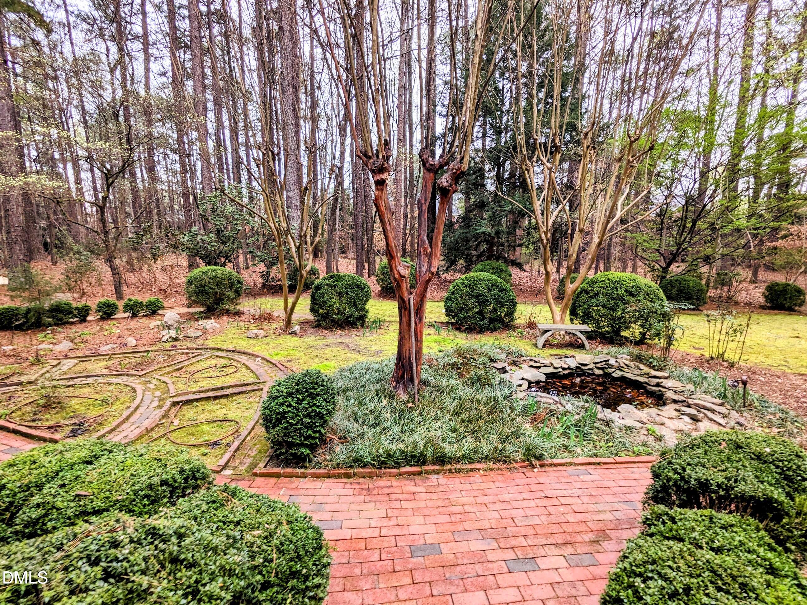 4901 Stoneridge Drive Raleigh, NC 27612 - Photo 19 of 50 a view of a yard with plants