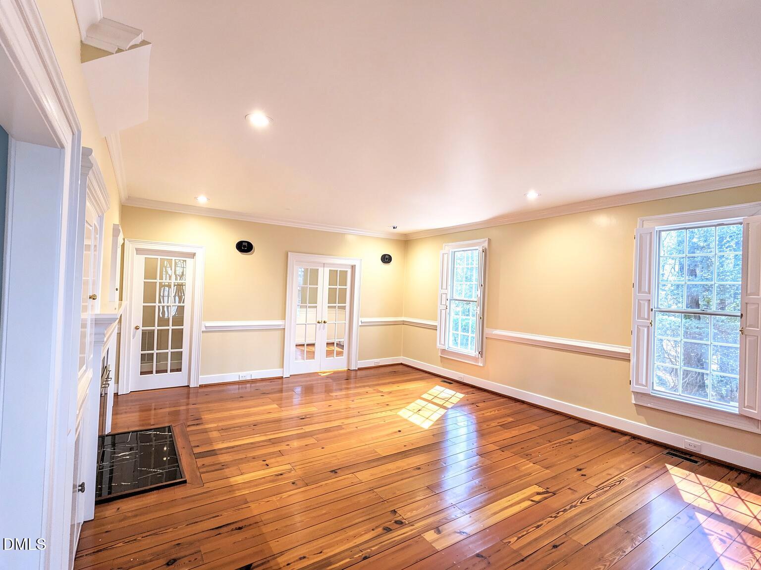 4901 Stoneridge Drive Raleigh, NC 27612 - Photo 33 of 50 Family Room Plantation Shutter Open