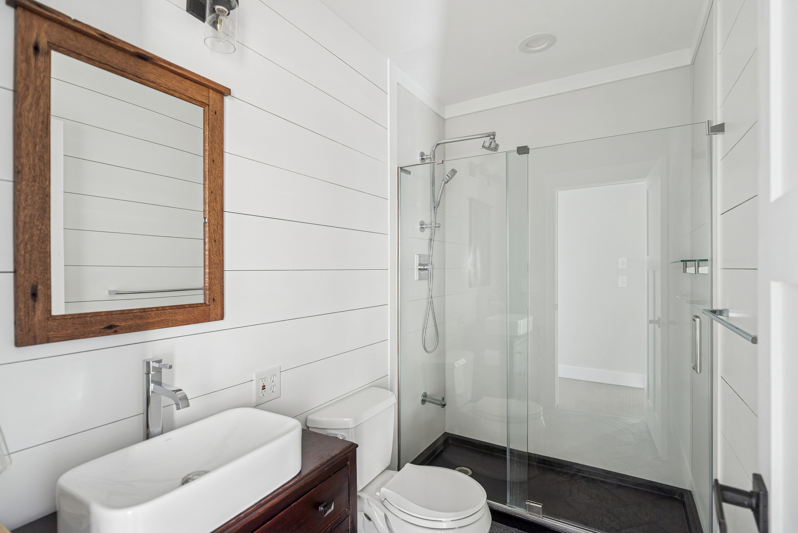 580 North Cedar Lake Road Lake Villa, IL 60046 - Photo 12 of 44 a bathroom with a toilet a sink and shower
