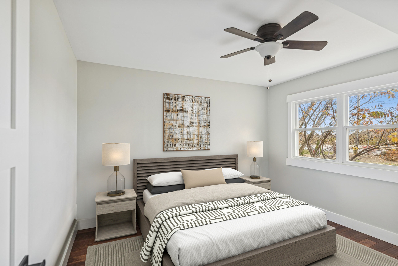 580 North Cedar Lake Road Lake Villa, IL 60046 - Photo 13 of 44 a bedroom with a large bed and a chandelier