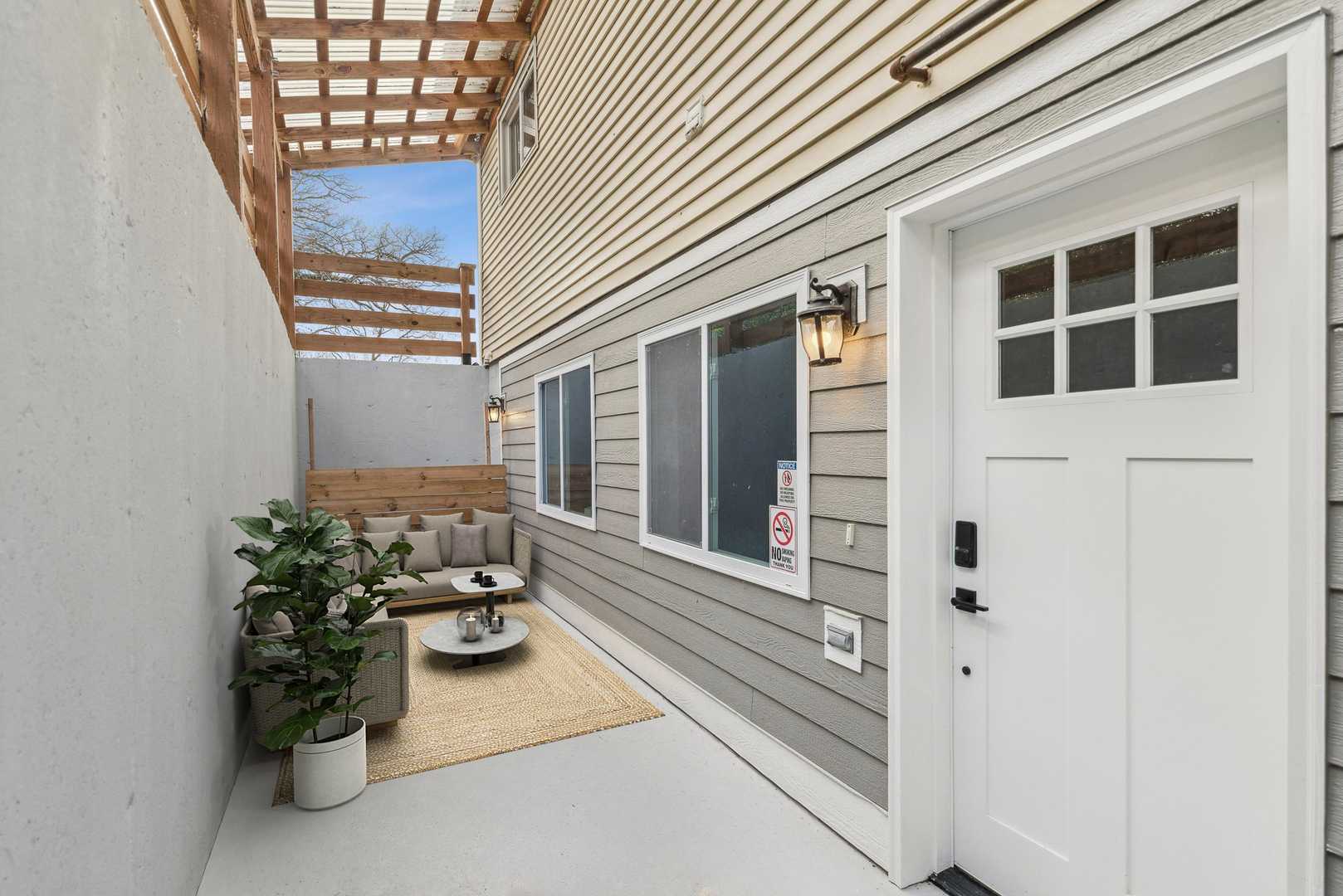 580 North Cedar Lake Road Lake Villa, IL 60046 - Photo 28 of 44 a view of a balcony with chairs potted plants with wooden floor