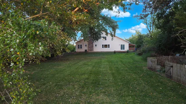 a view of backyard with green space