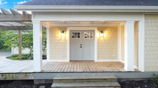 an aerial view of residential houses with outdoor space