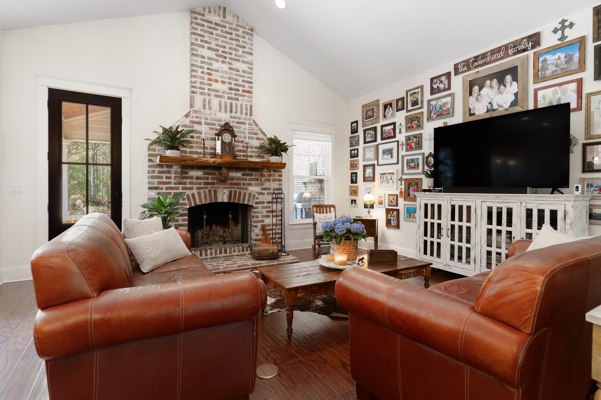 4351 Poverty Creek Road Crestview, FL 32539 - Photo 15 of 53 a living room with furniture and a flat screen tv