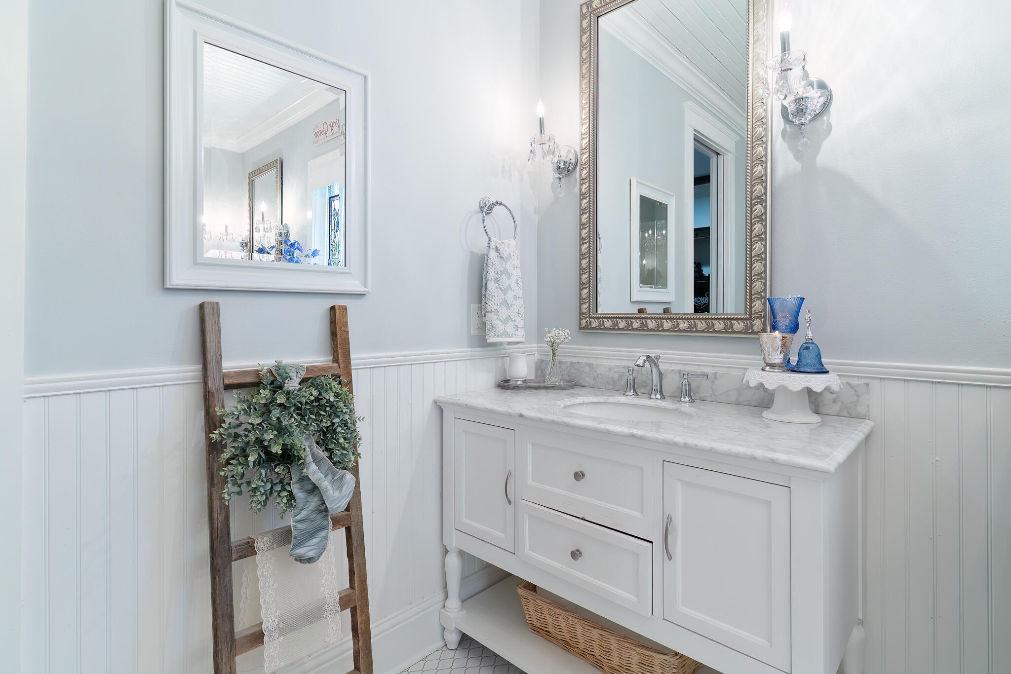 4351 Poverty Creek Road Crestview, FL 32539 - Photo 22 of 53 a bathroom with a sink and a mirror