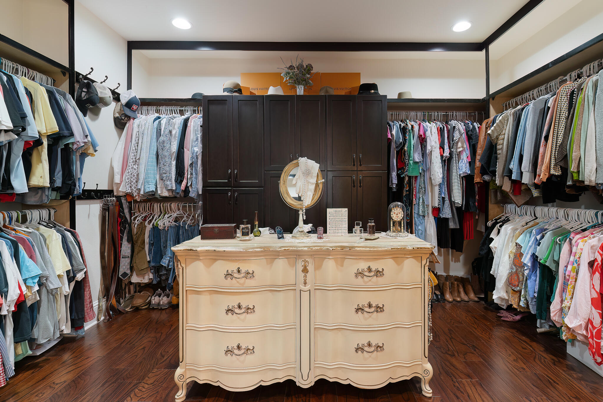 4351 Poverty Creek Road Crestview, FL 32539 - Photo 25 of 53 a view of walk in closet with clothes and shoes