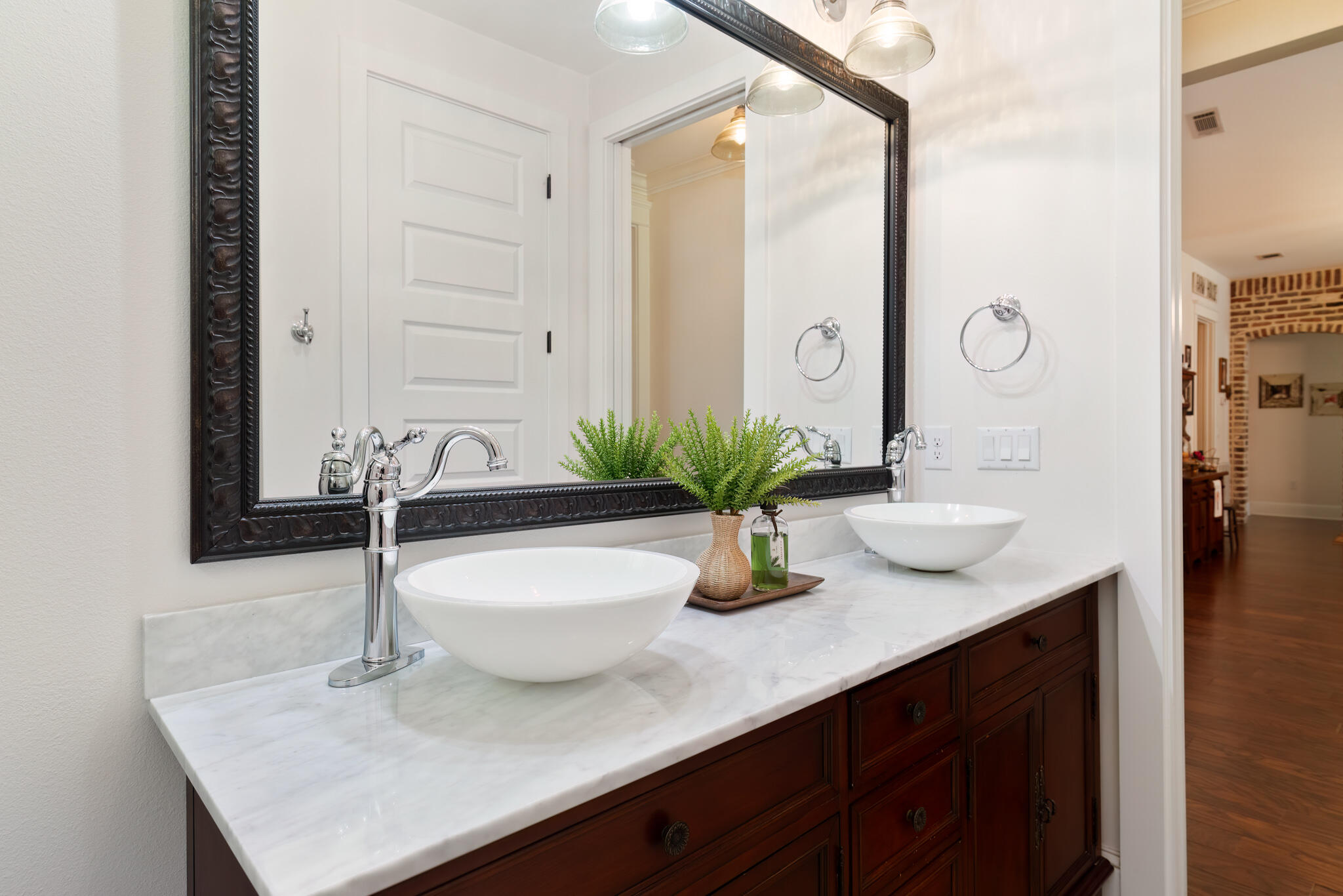 4351 Poverty Creek Road Crestview, FL 32539 - Photo 28 of 53 a bathroom with a sink a vanity and a mirror