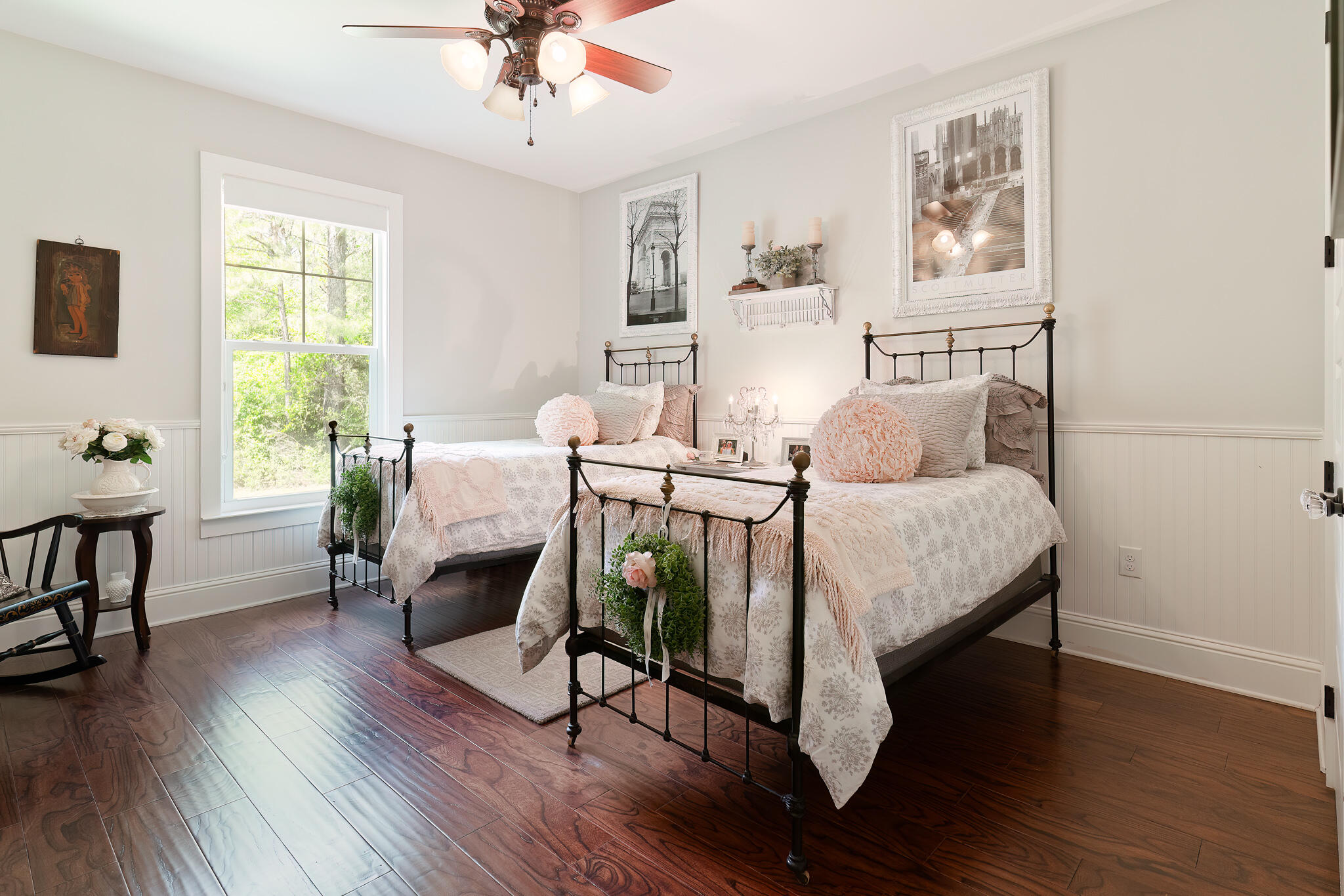 4351 Poverty Creek Road Crestview, FL 32539 - Photo 29 of 53 a bedroom with a bed and a table in it with wooden floor