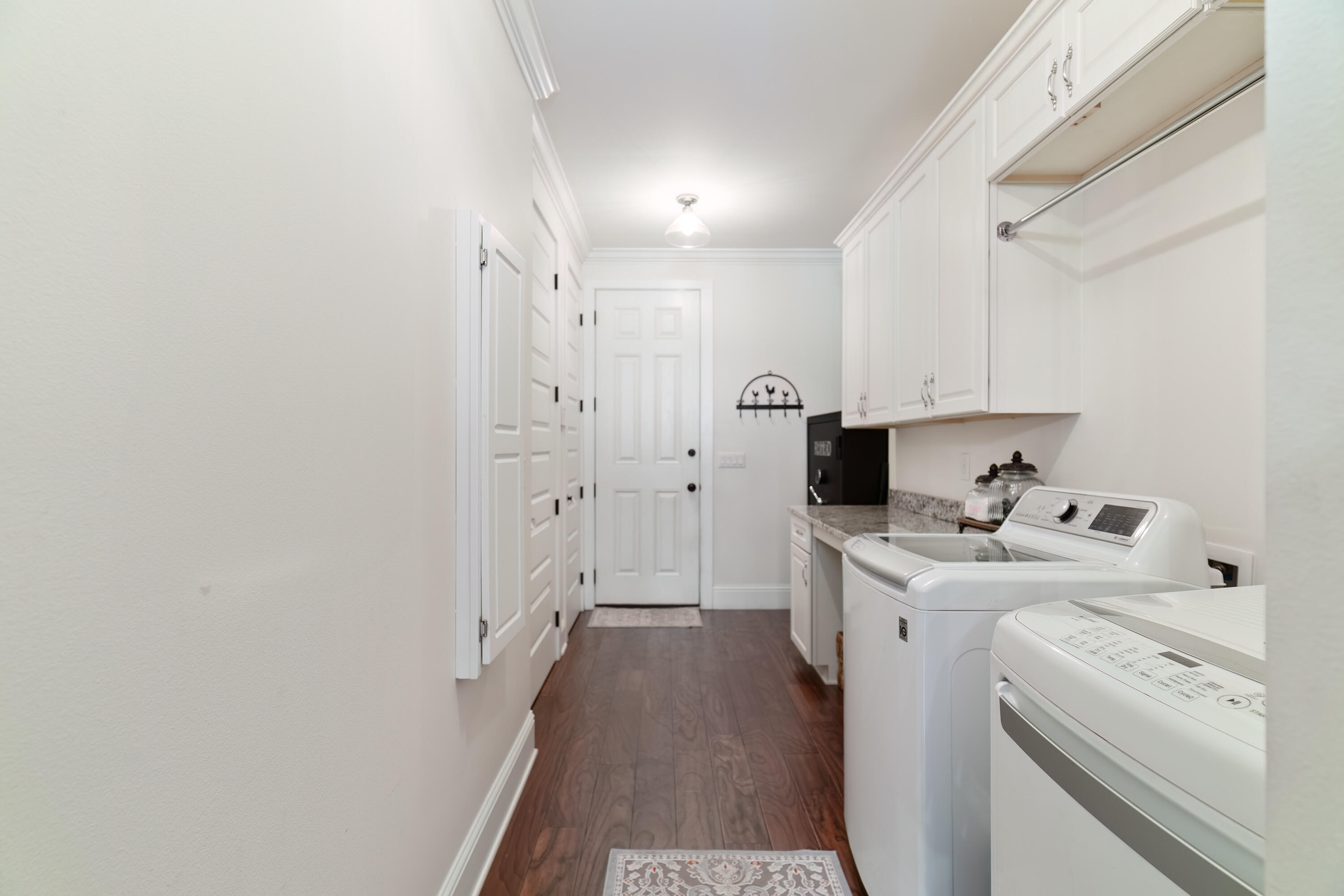 4351 Poverty Creek Road Crestview, FL 32539 - Photo 32 of 53 a view of a storage & utility room with two washing machine