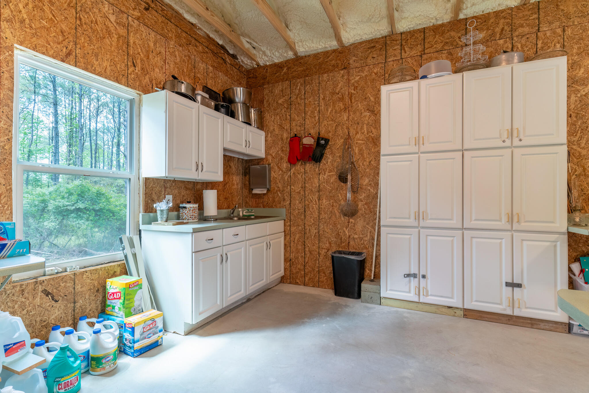 4351 Poverty Creek Road Crestview, FL 32539 - Photo 43 of 53 a kitchen with refrigerator and window