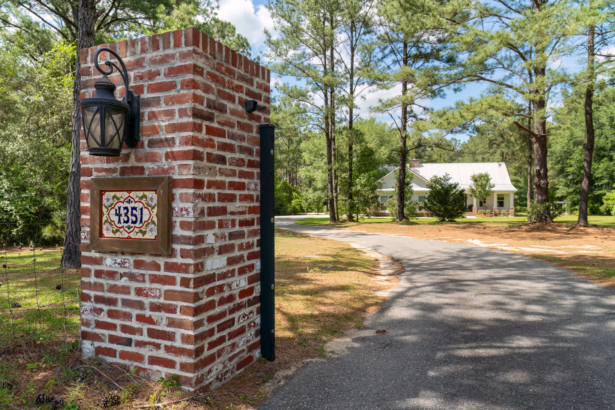 4351 Poverty Creek Road Crestview, FL 32539 - Photo 47 of 53 a view of a building with a street