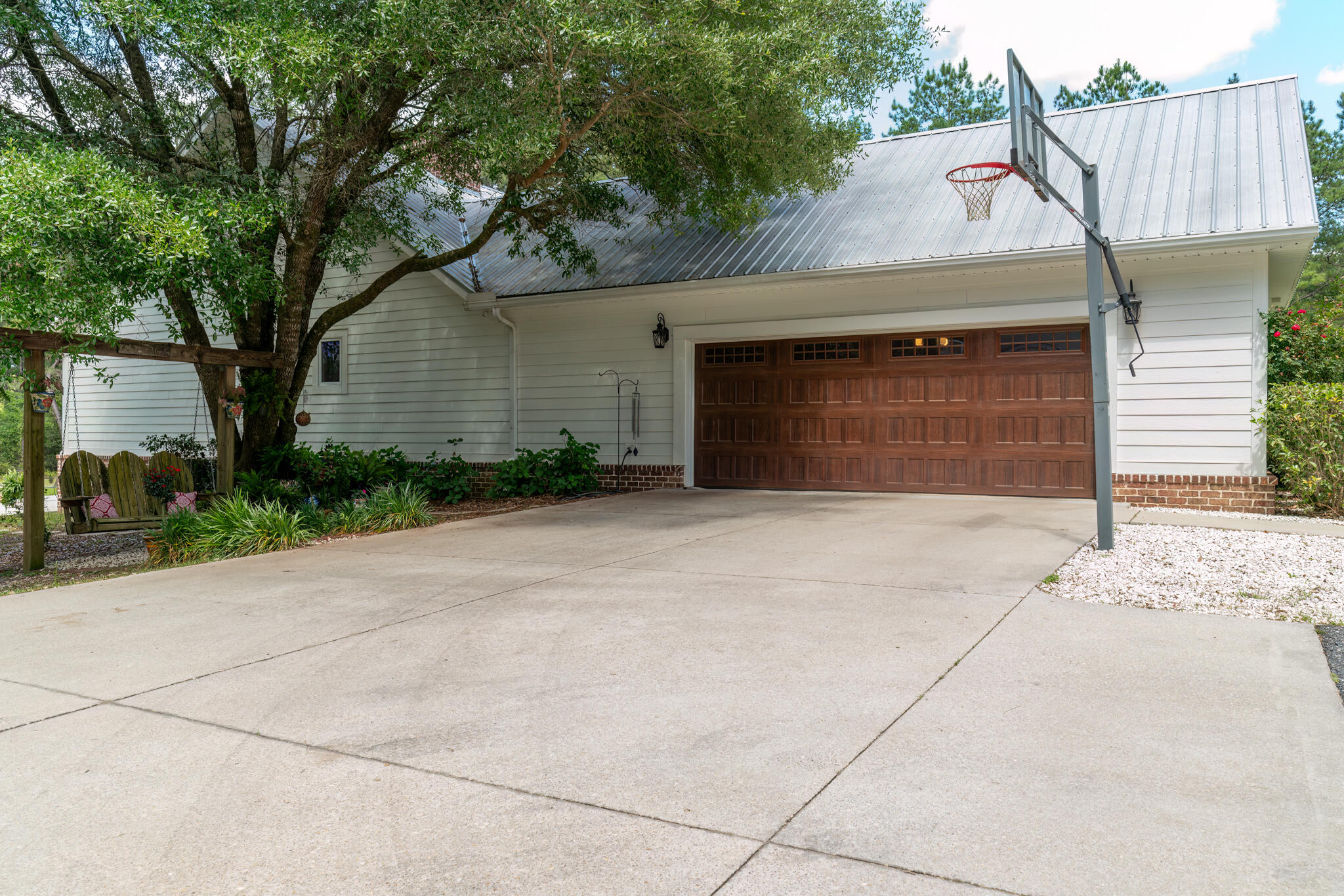 4351 Poverty Creek Road Crestview, FL 32539 - Photo 5 of 53 a house with trees in front of it