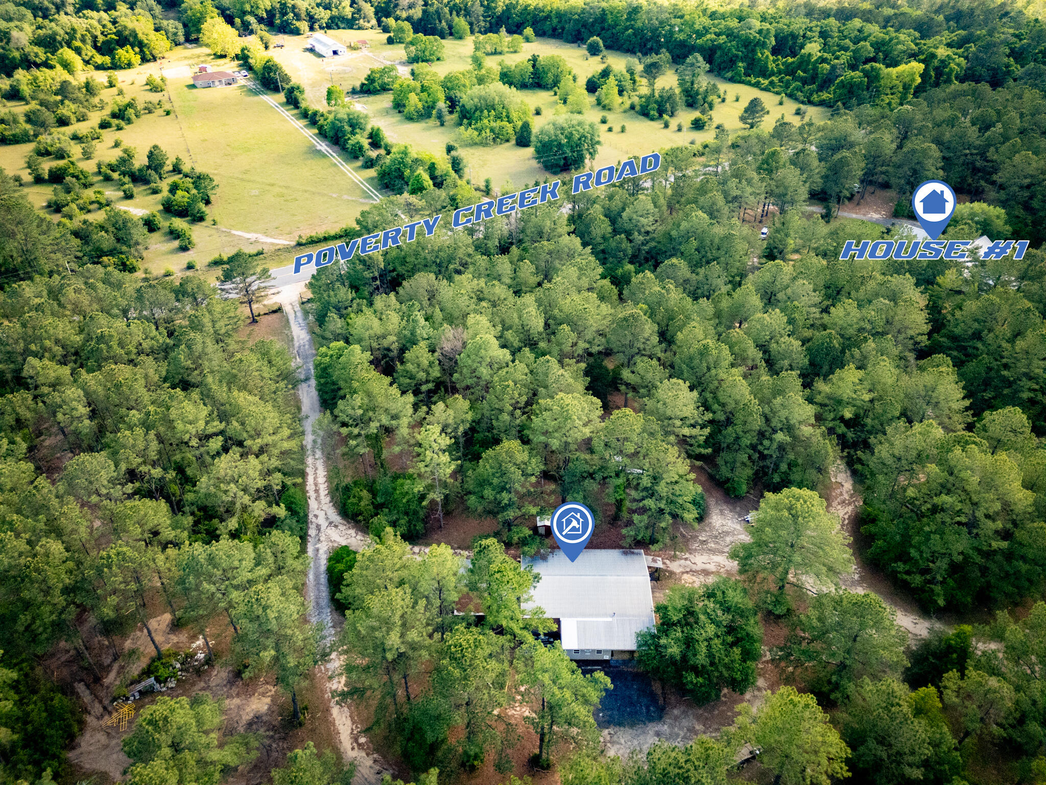 4351 Poverty Creek Road Crestview, FL 32539 - Photo 50 of 53 an aerial view of a house with a yard and lake view