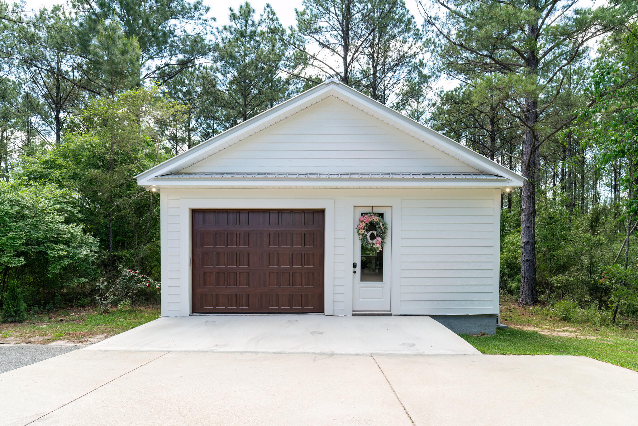 4351 Poverty Creek Road Crestview, FL 32539 - Photo 6 of 53 a front view of a house with garage
