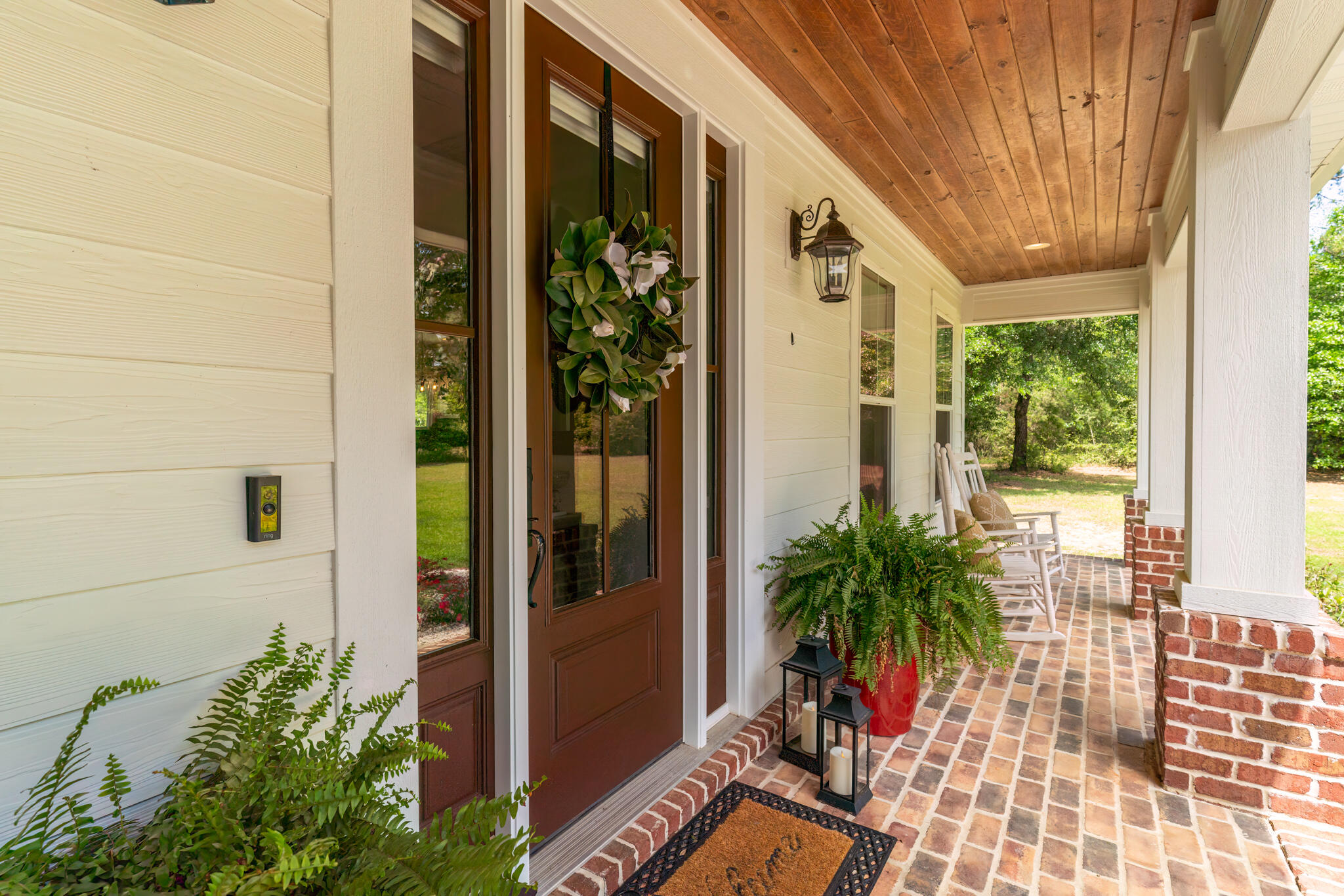 4351 Poverty Creek Road Crestview, FL 32539 - Photo 8 of 53 a potted plants sitting in front of a door