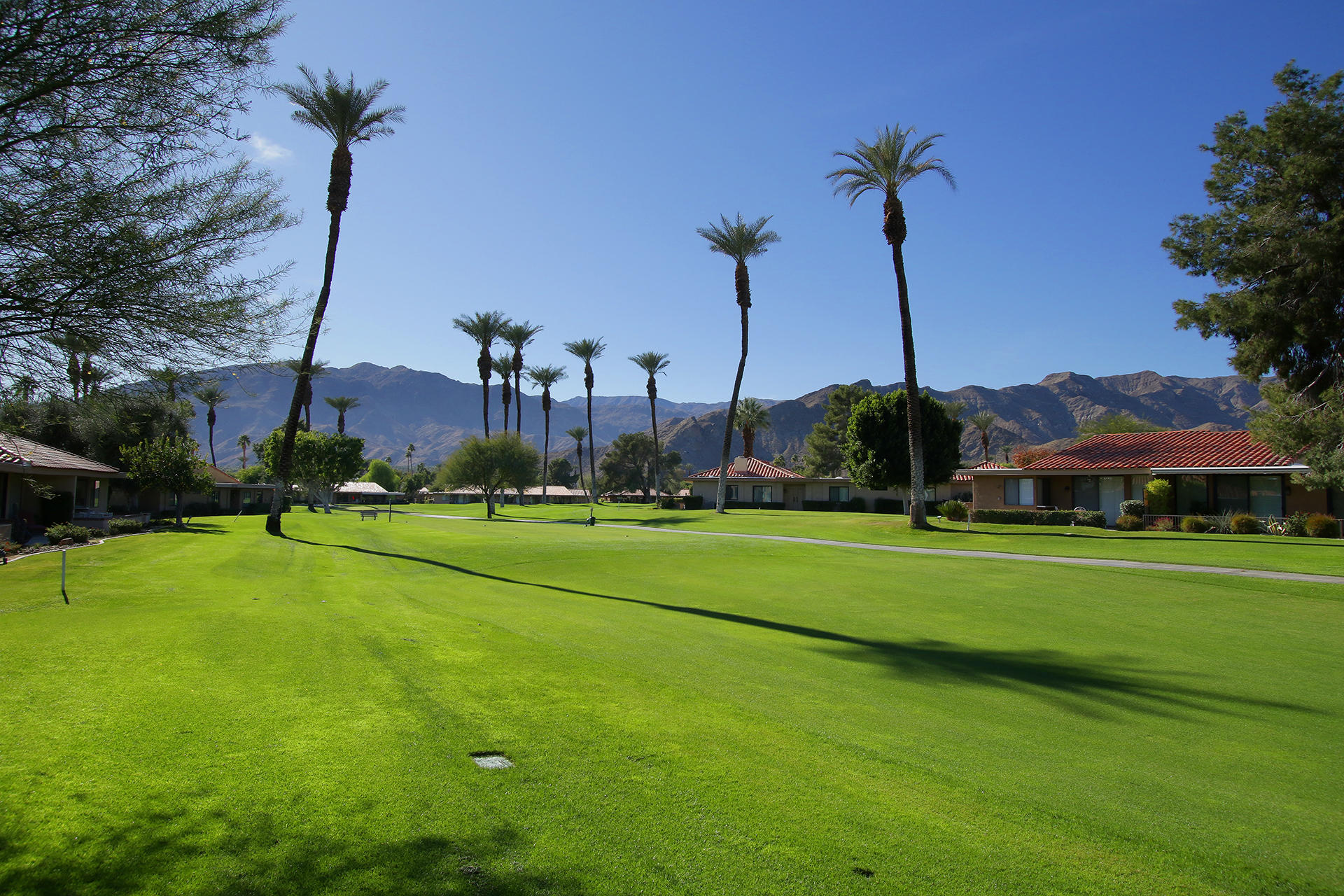 6 Cadiz Drive Rancho Mirage, CA 92270 - Photo 1 of 27 a view of a golf course with a park