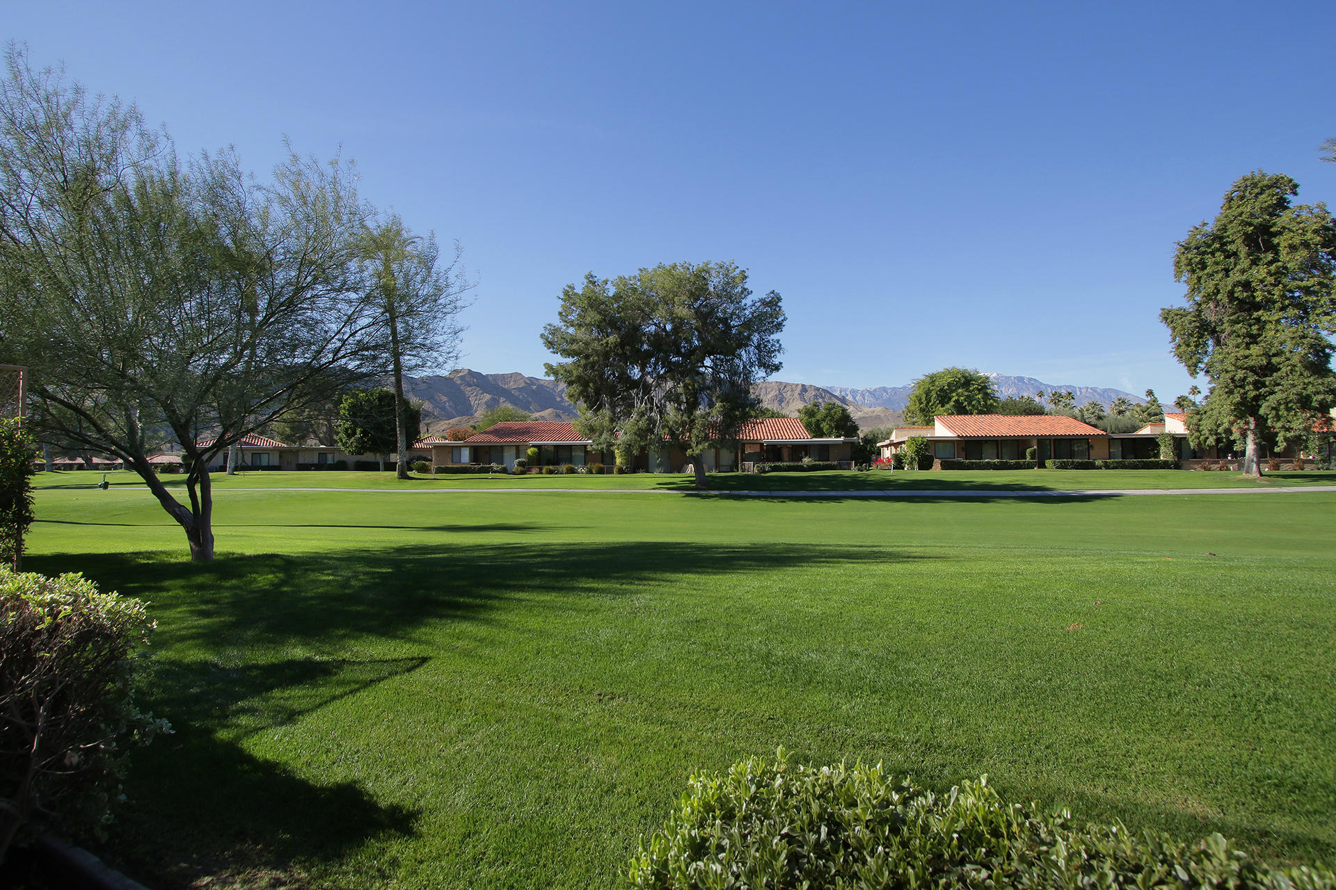 6 Cadiz Drive Rancho Mirage, CA 92270 - Photo 11 of 27 a view of grassy field with benches and trees