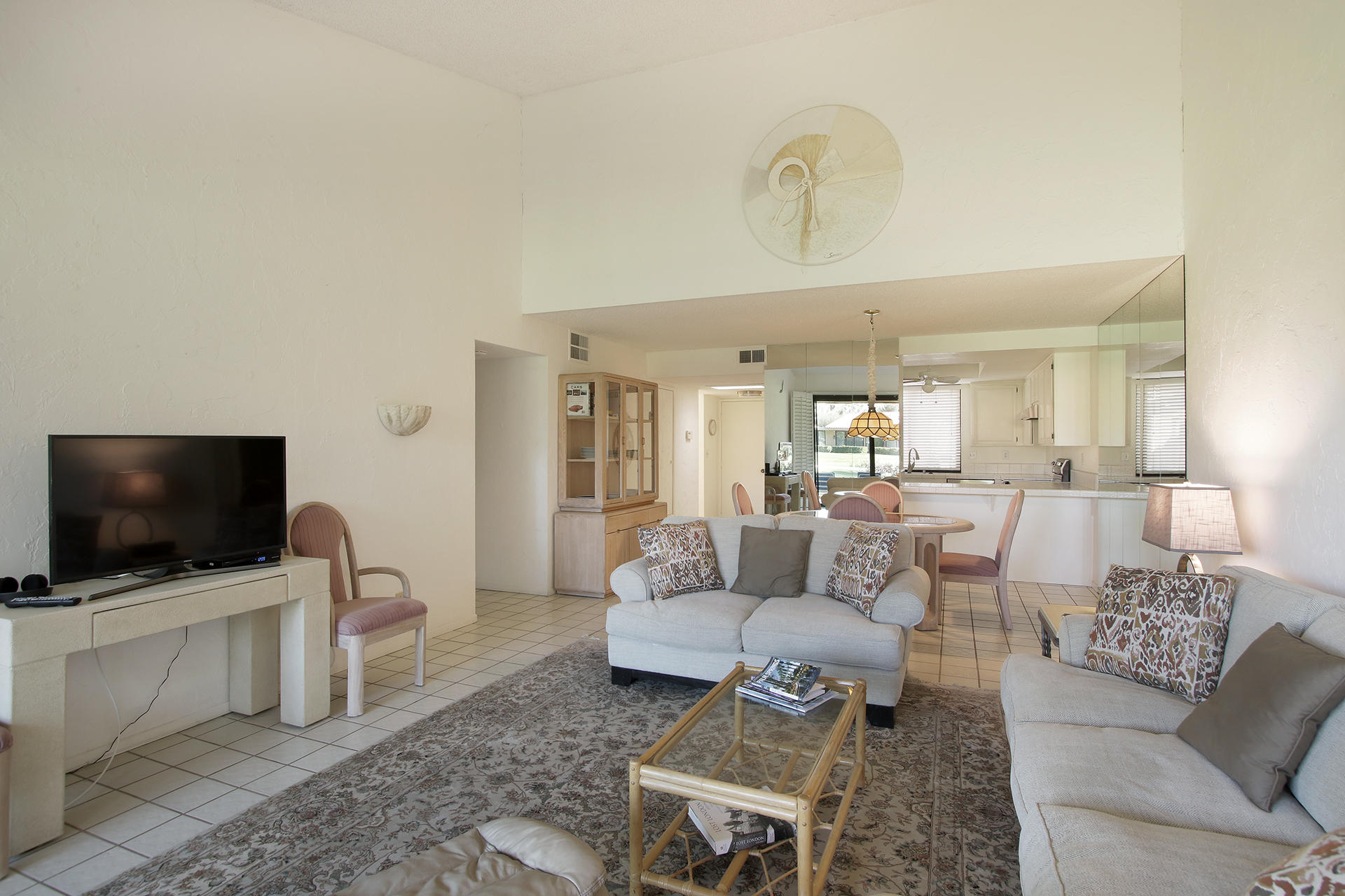 6 Cadiz Drive Rancho Mirage, CA 92270 - Photo 15 of 27 a living room with furniture and a flat screen tv