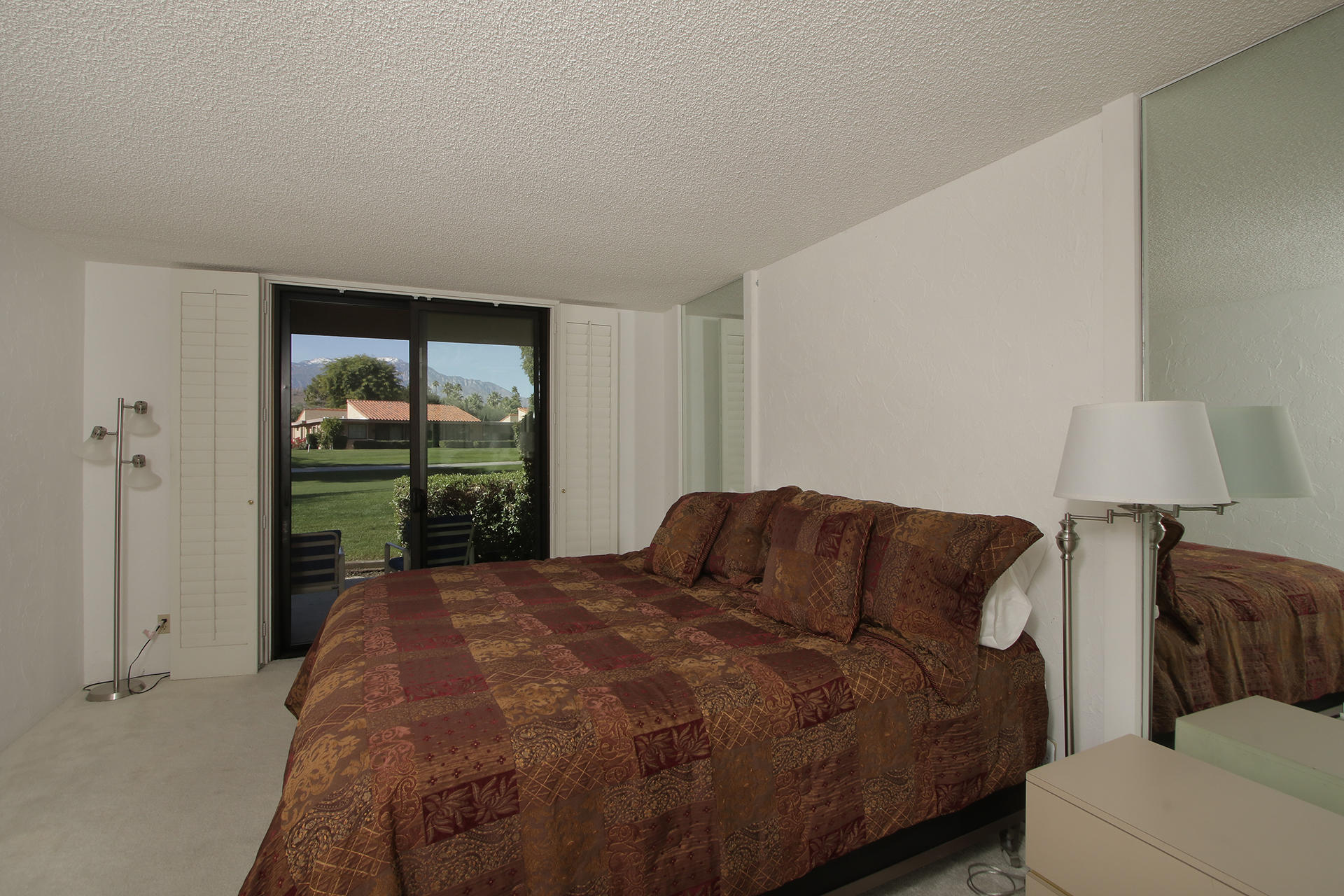 6 Cadiz Drive Rancho Mirage, CA 92270 - Photo 20 of 27 a bedroom with a bed and a window