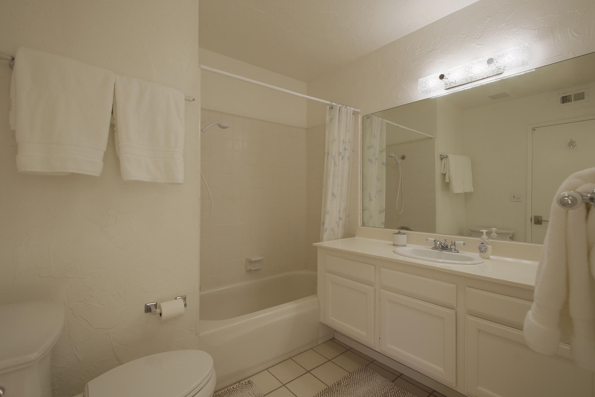 6 Cadiz Drive Rancho Mirage, CA 92270 - Photo 25 of 27 a bathroom with a sink toilet and shower