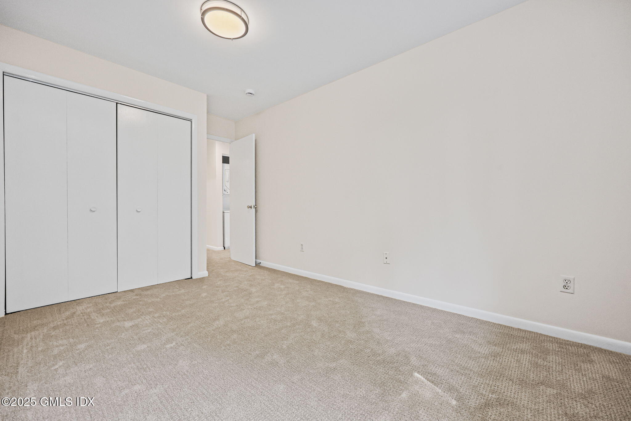 11 Maple Avenue, Unit 202 Greenwich, CT 06830 - Photo 9 of 18 a view of an empty room