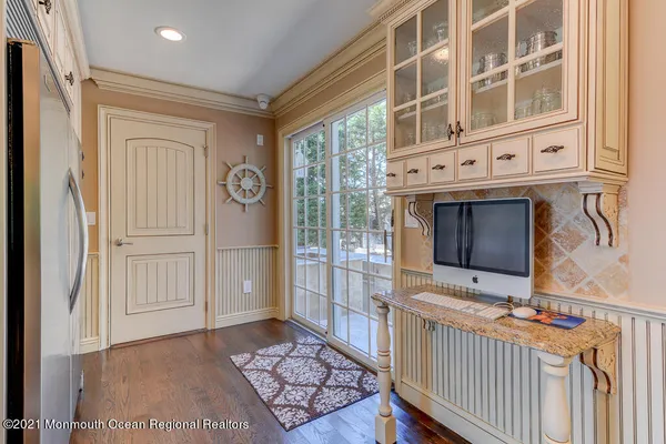 a view of a hallway with windows