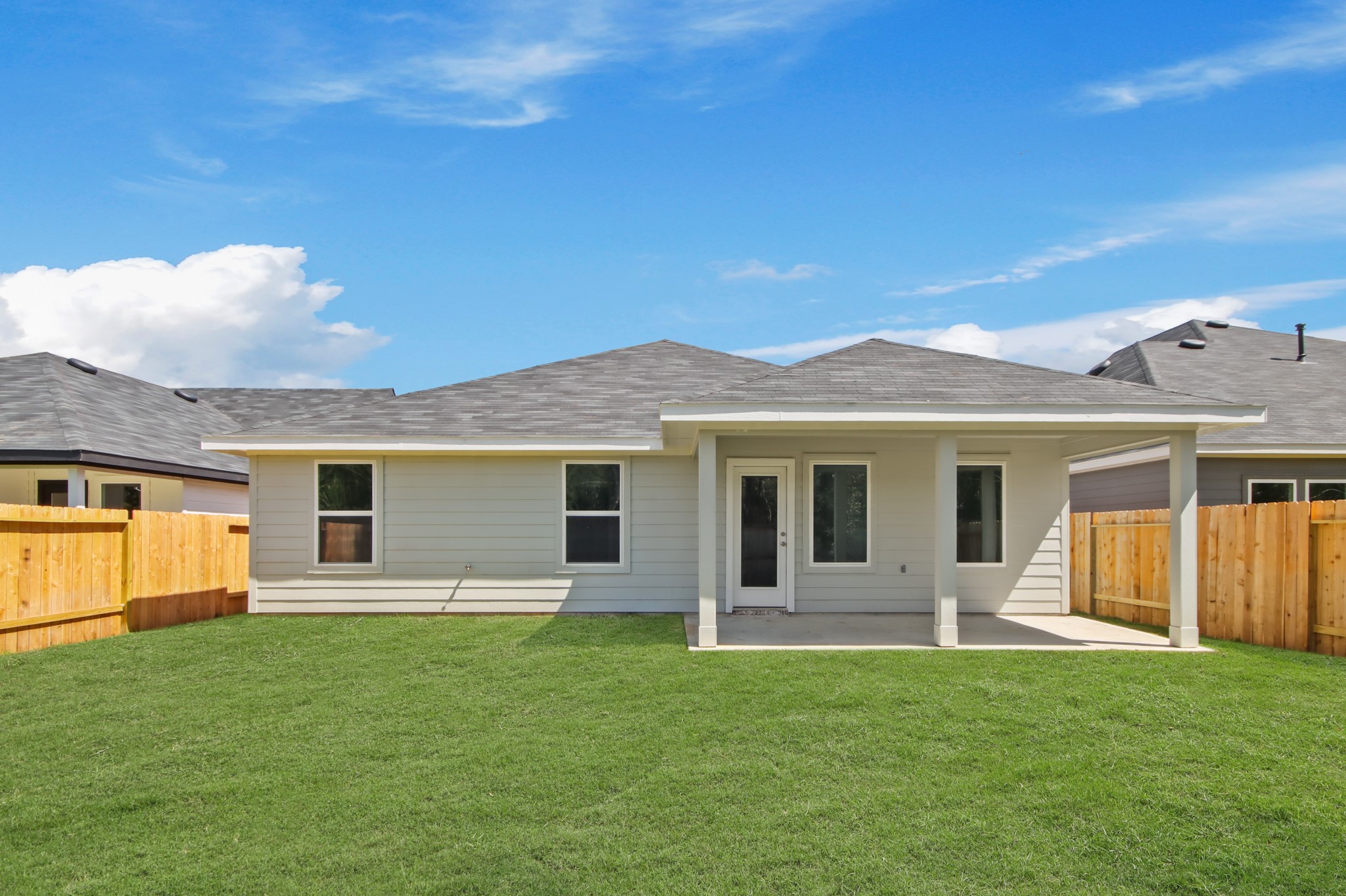 4265 Multnomah Falls Drive Conroe, TX 77303 - Photo 9 of 20 a front view of house with yard and green space