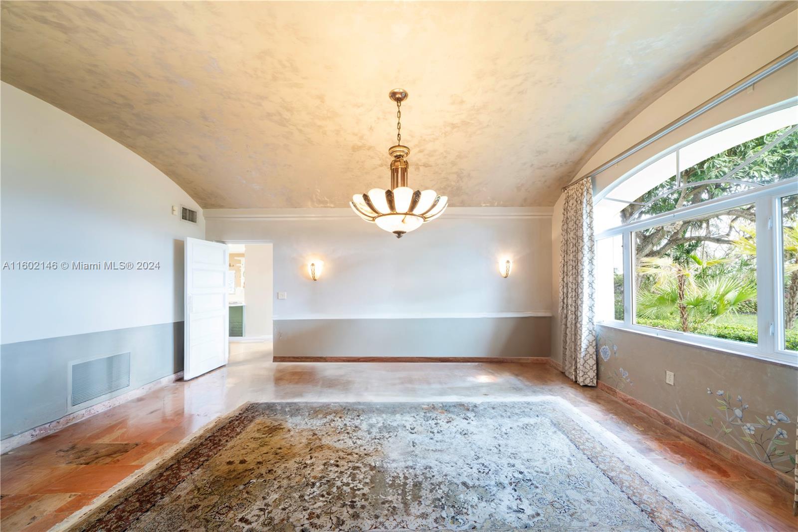 5801 Alton Road Miami Beach, FL 33140 - Photo 13 of 35 a view of an empty room and window