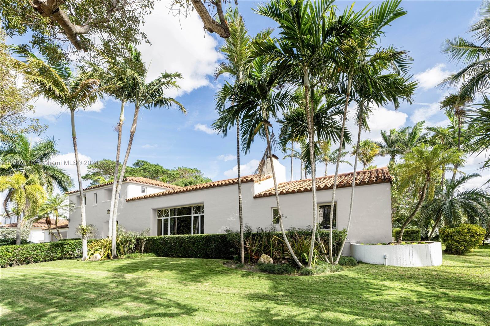 5801 Alton Road Miami Beach, FL 33140 - Photo 34 of 35 front view of house with a yard