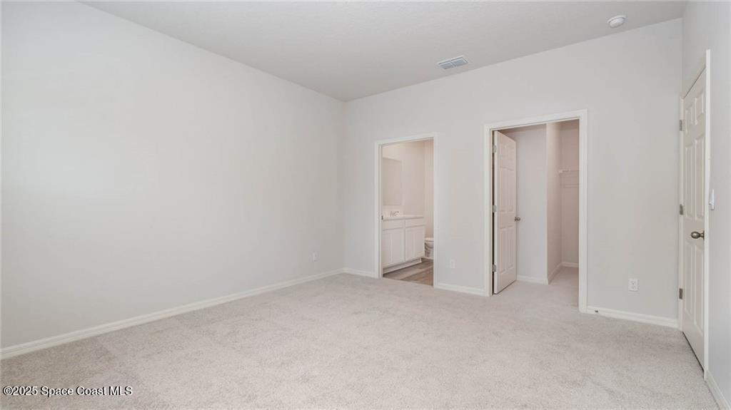9036 Orchid Reserve Circle Sebastian, FL 32958 - Photo 17 of 25 a view of an empty room