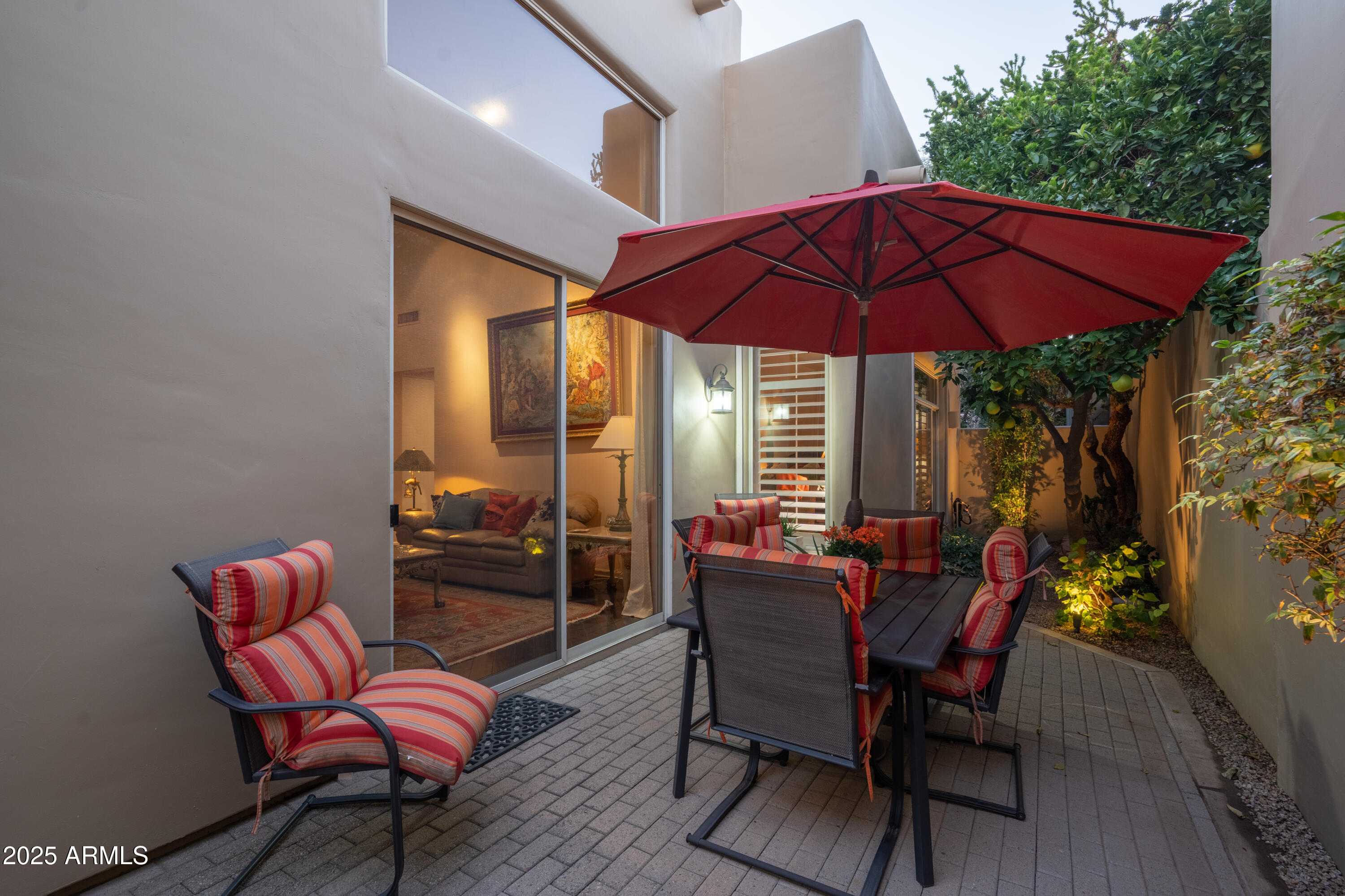 6711 East Camelback Road, Unit 21 Scottsdale, AZ 85251 - Photo 21 of 33 a view of a chair and table in the patio