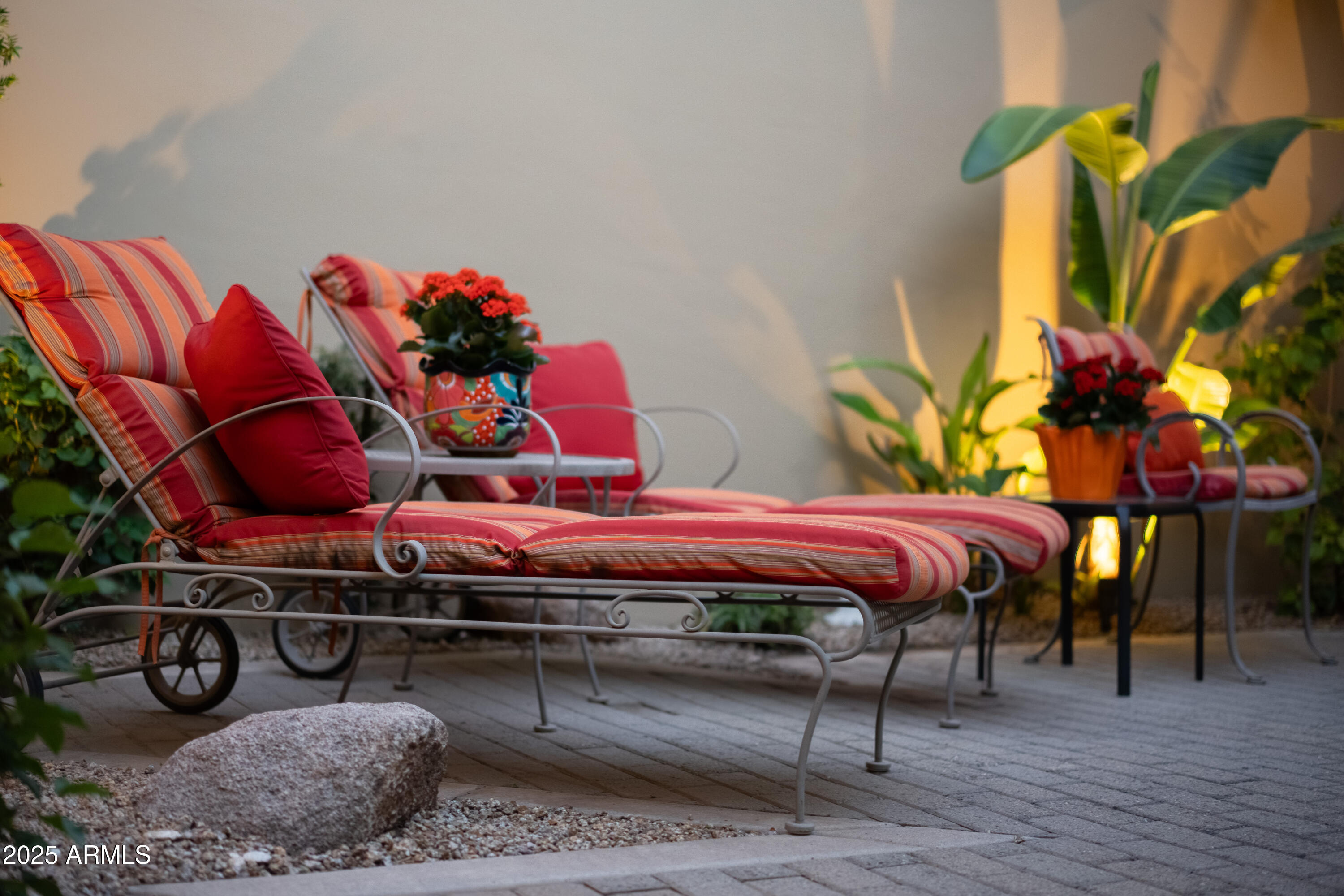 6711 East Camelback Road, Unit 21 Scottsdale, AZ 85251 - Photo 22 of 33 a bedroom with a bed a table and chair