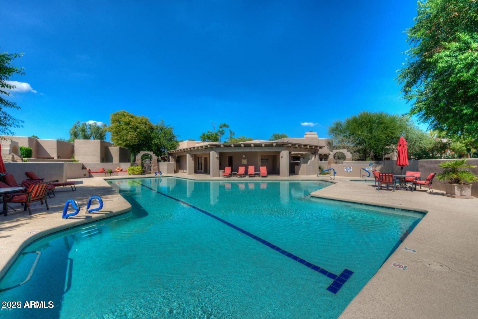 6711 East Camelback Road, Unit 21 Scottsdale, AZ 85251 - Photo 28 of 33 a view of a house with a yard porch and sitting area