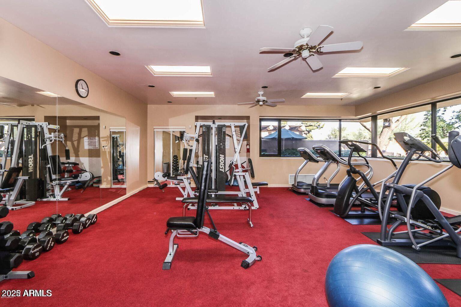 6711 East Camelback Road, Unit 21 Scottsdale, AZ 85251 - Photo 29 of 33 a view of a room with gym equipment
