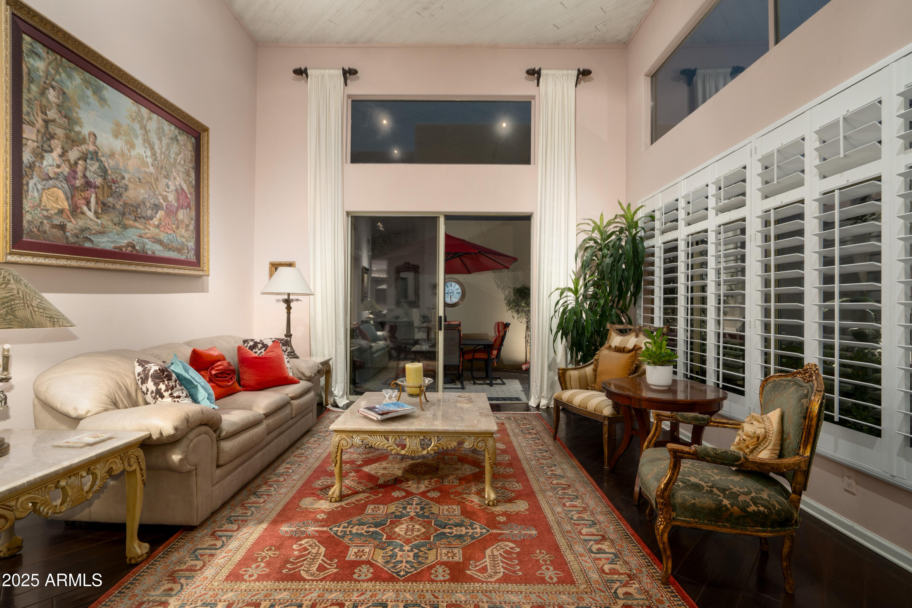 6711 East Camelback Road, Unit 21 Scottsdale, AZ 85251 - Photo 7 of 33 a living room with furniture and a fireplace