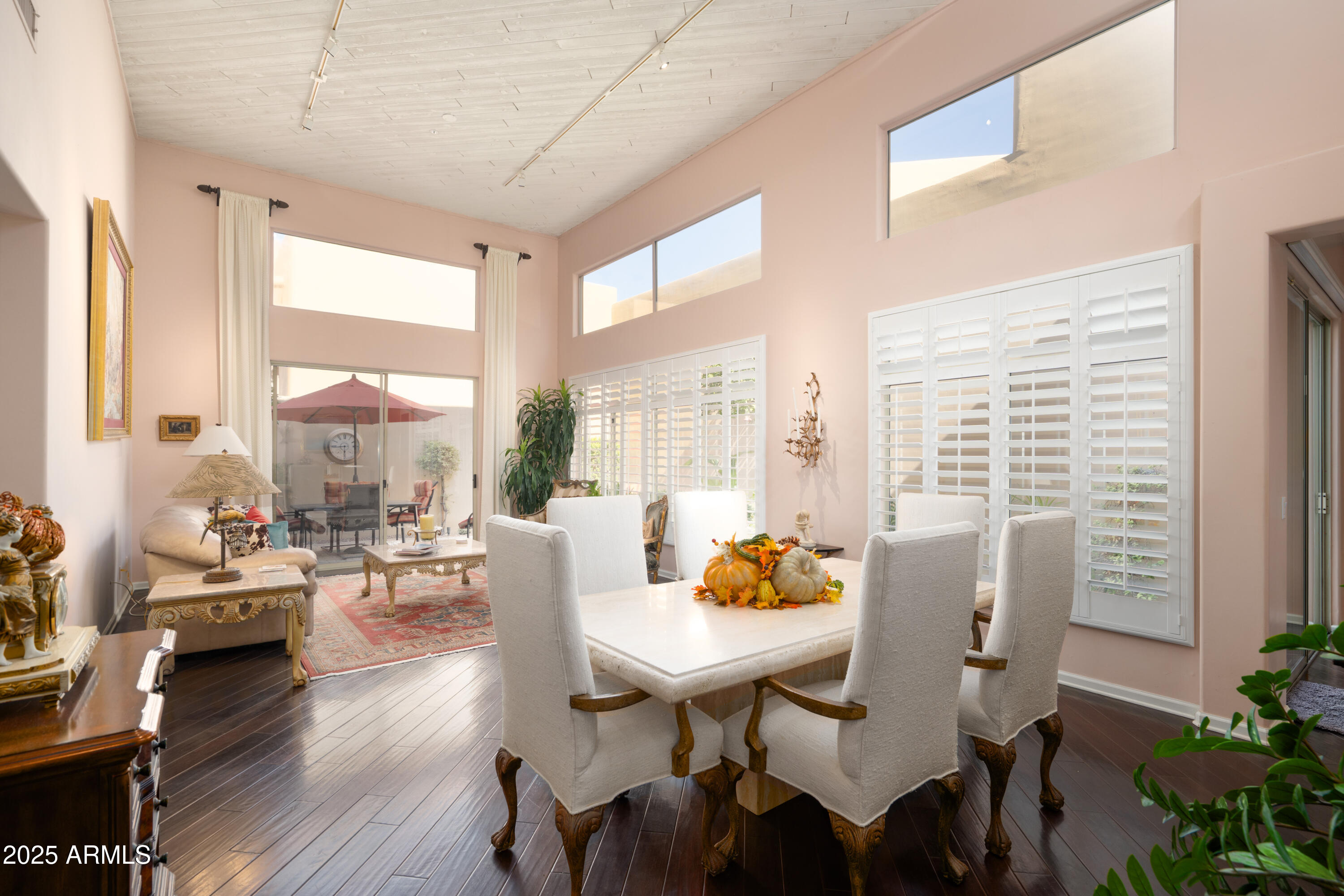 6711 East Camelback Road, Unit 21 Scottsdale, AZ 85251 - Photo 8 of 33 a outdoor dining space with furniture and wooden floor