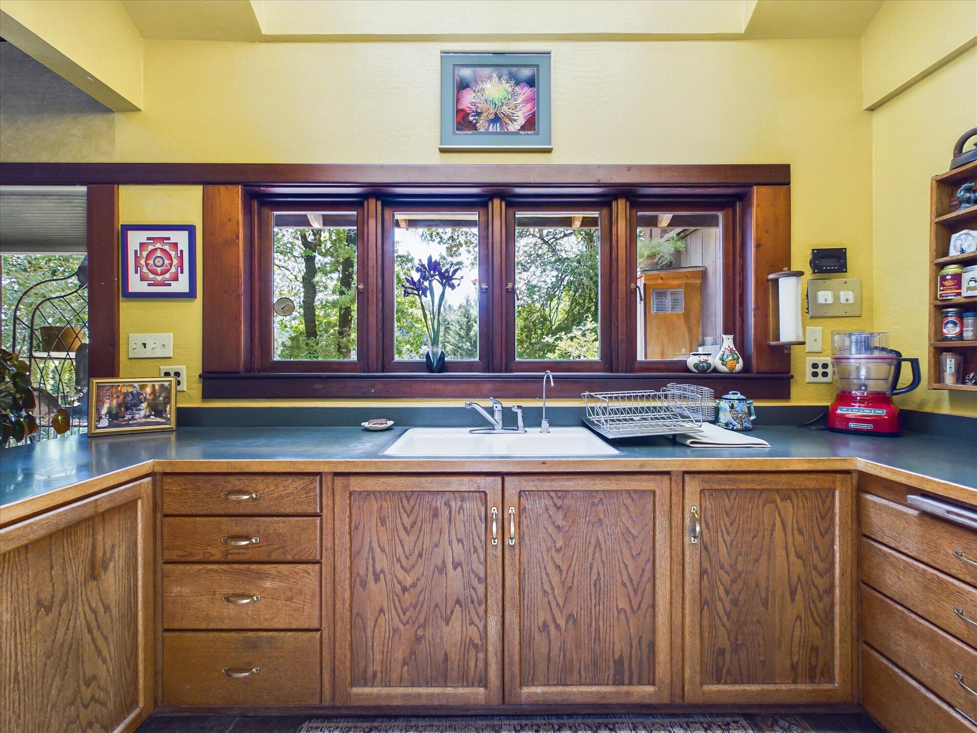 1215 Perry Meadow Road Redway, CA 95560 - Photo 31 of 140 a kitchen with a sink and large window