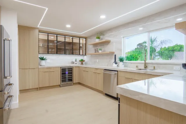 a kitchen with a stove and a microwave
