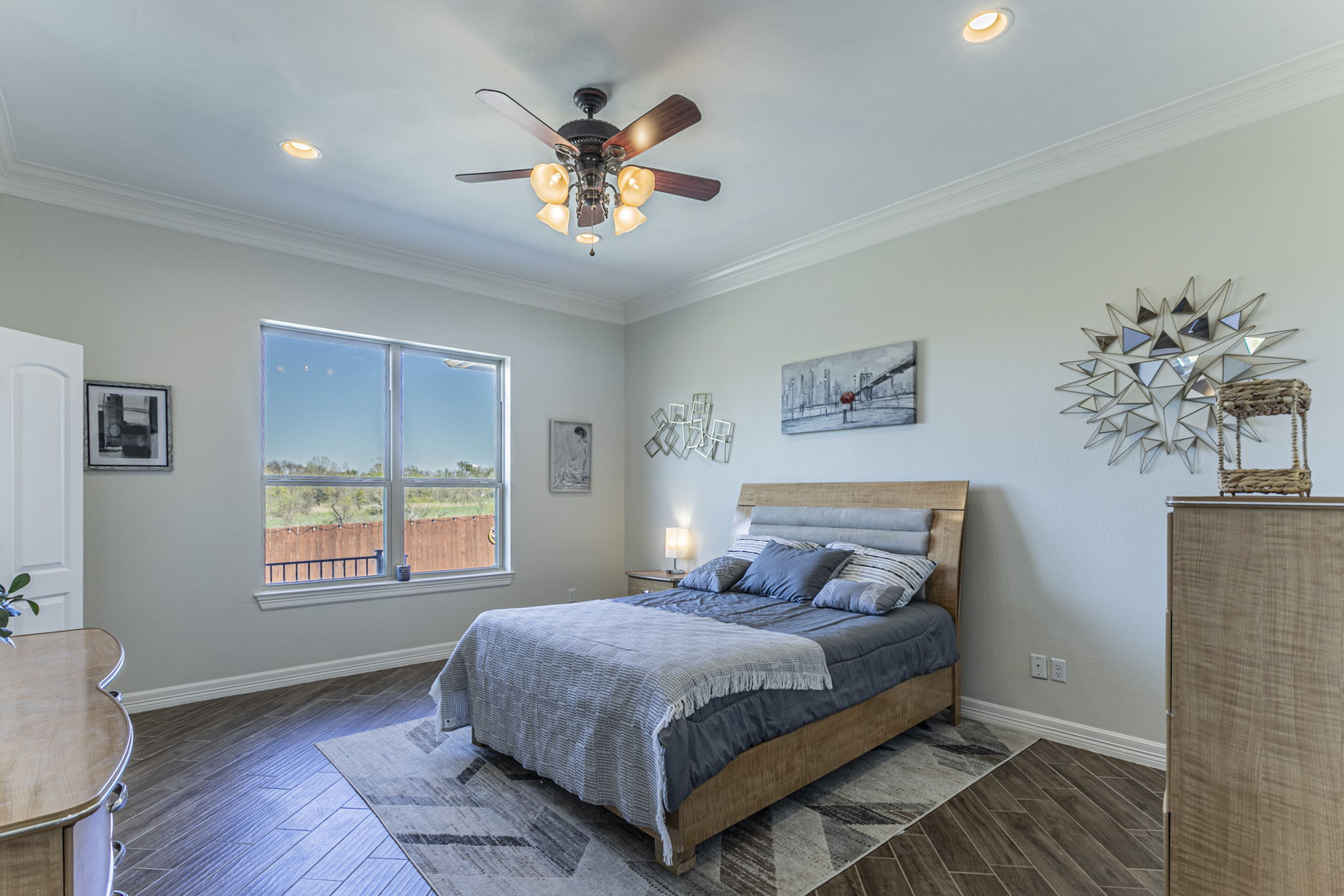 300 Magan Lane Jarrell, TX 76537 - Photo 13 of 33 Bedroom with wood tiled floors, ornamental molding, ceiling fan, and recessed lighting