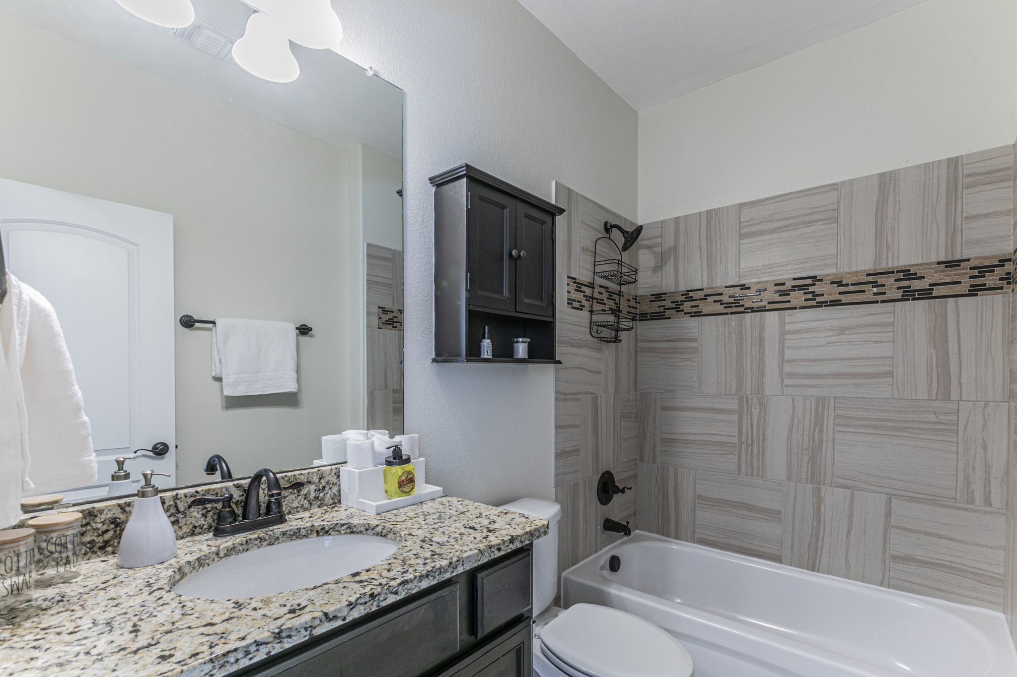 300 Magan Lane Jarrell, TX 76537 - Photo 19 of 33 Bathroom with vanity and shower / tub combination