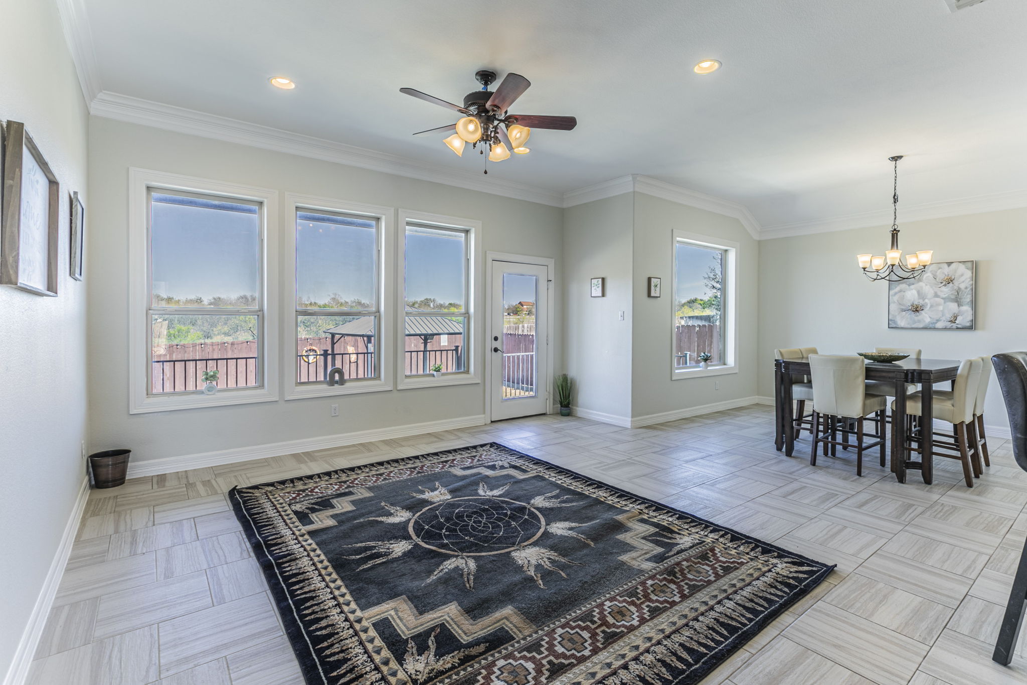300 Magan Lane Jarrell, TX 76537 - Photo 2 of 33 Dining area featuring ceiling fan, hanging lights, and ornamental molding
